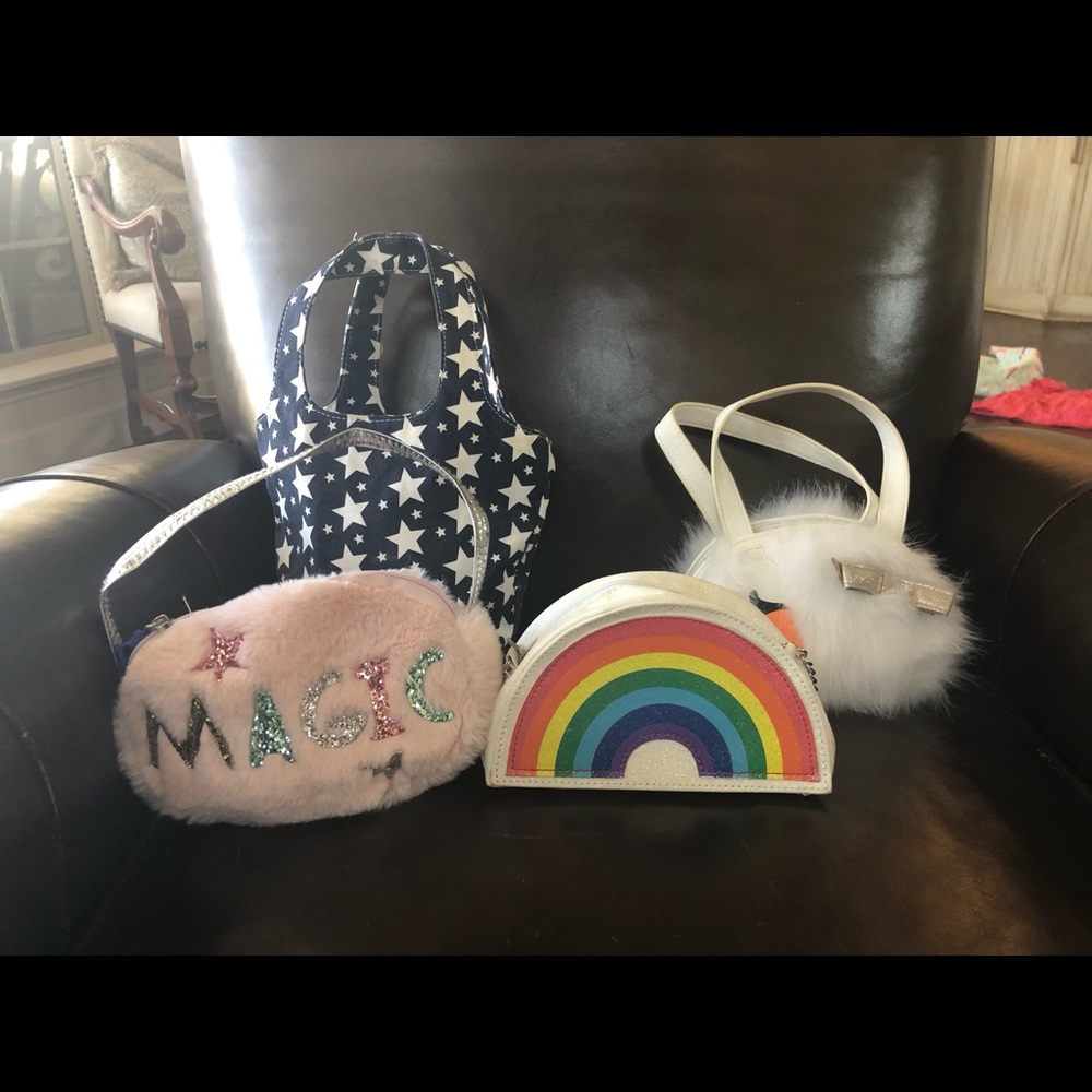 4 gently used girls purses.